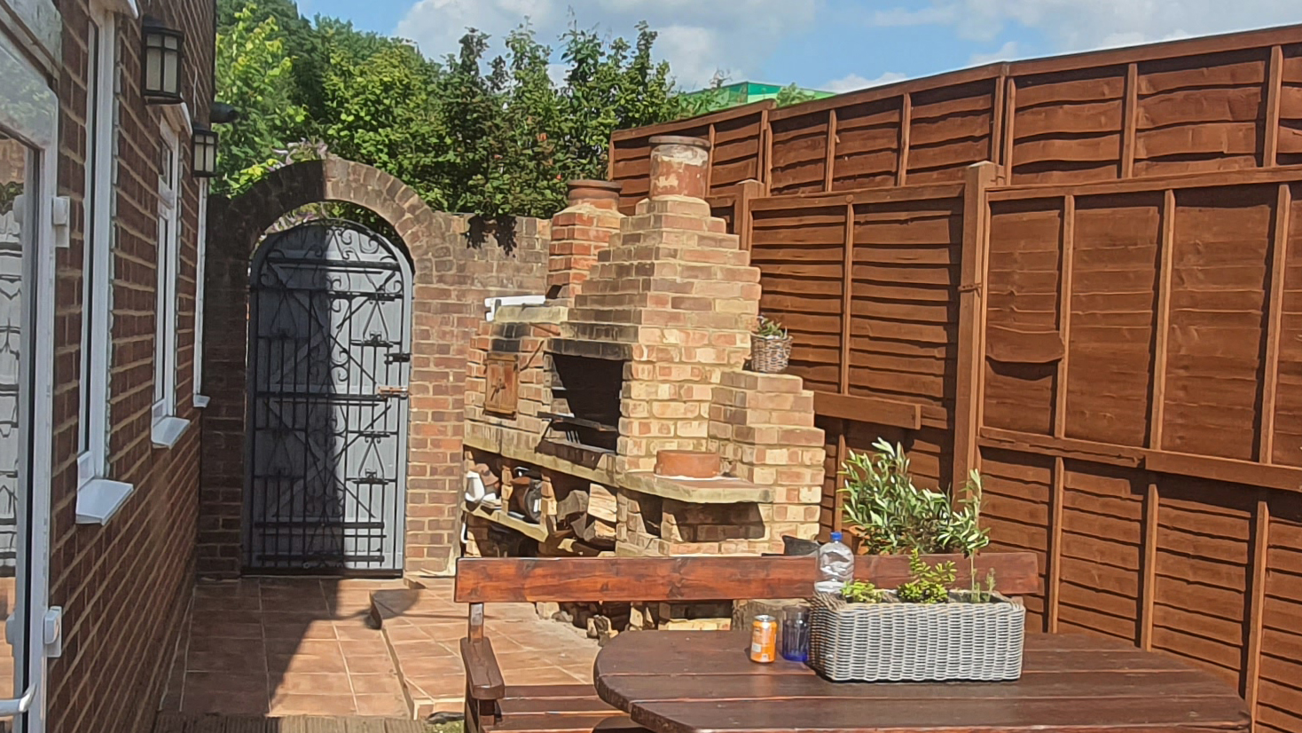 Self contracted pizza oven with bricks.